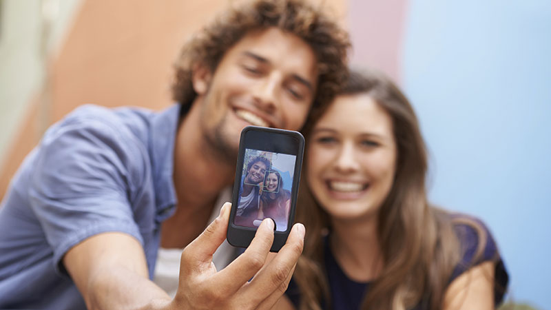 Couple taking #firstdateselfie.