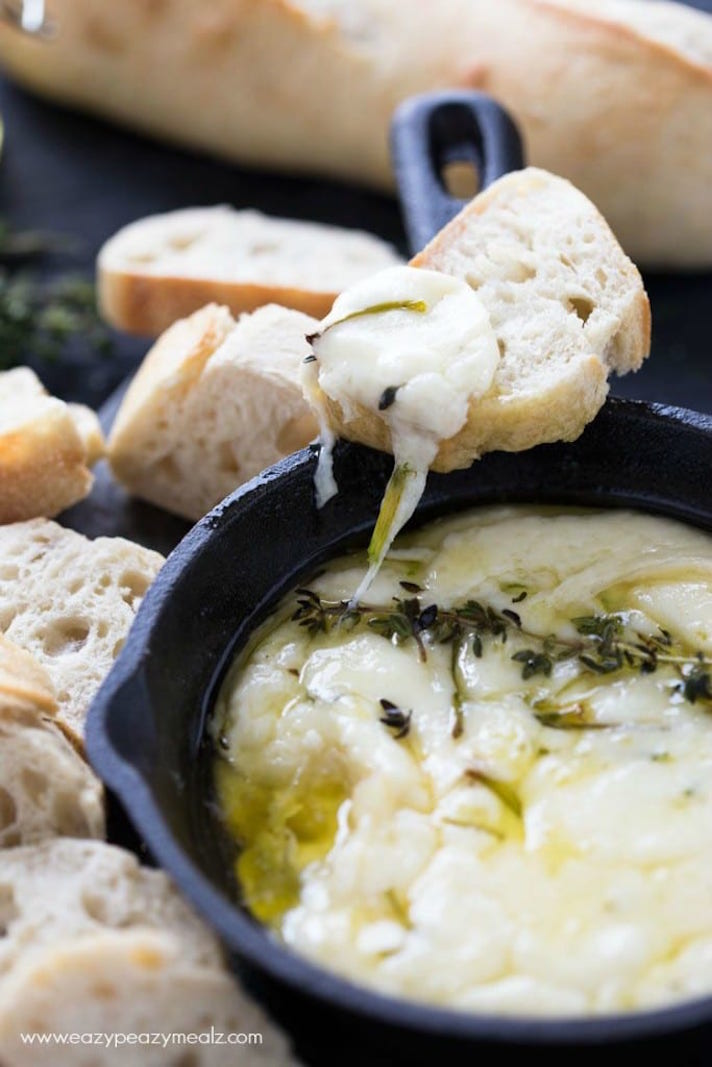 STYLECASTER | 25 Festive Recipes That Will Impress Your Friends on New Year’s Eve | Baked Fontinella Cheese Dip