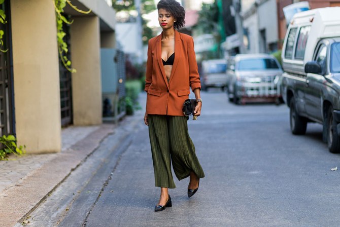 STYLECASTER | How to Wear Clashing Colors | Green Culottes and Orange Blazer
