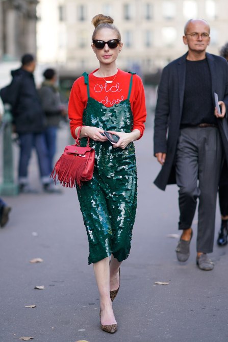 STYLECASTER | How to Wear Clashing Colors | Red Sweatshirt with Green Sequin Dress Over Top