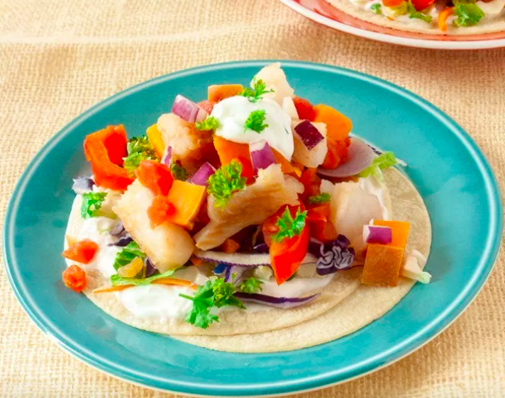 STYLECASTER | 17 Slow-Cooker Seafood Recipes for When You're Sick of Chili | Fish Tacos With Sweet Potatoes