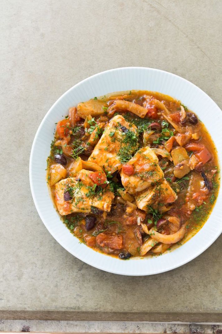 STYLECASTER | 17 Slow-Cooker Seafood Recipes for When You're Sick of Chili | Moroccan Fish Tagine