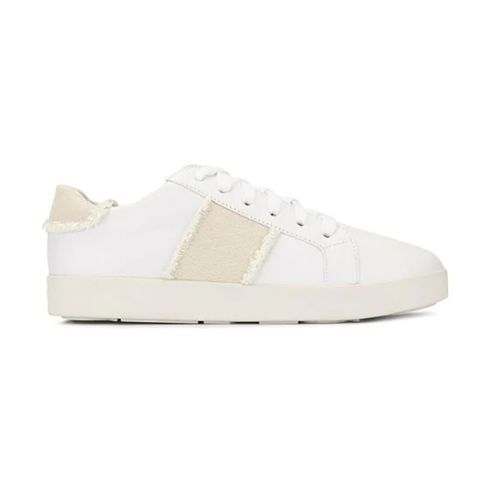 STYLECASTER | Dainty White Sneakers You Could Definitely Wear Under Your Bridal Gown