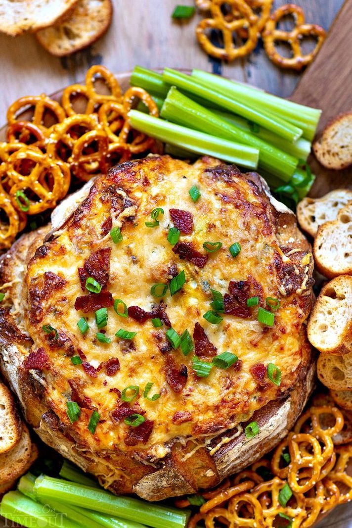 STYLECASTER | 17 Halloween Dips You Can Serve In A Pumpkin | Baked Bacon Cheese Dip