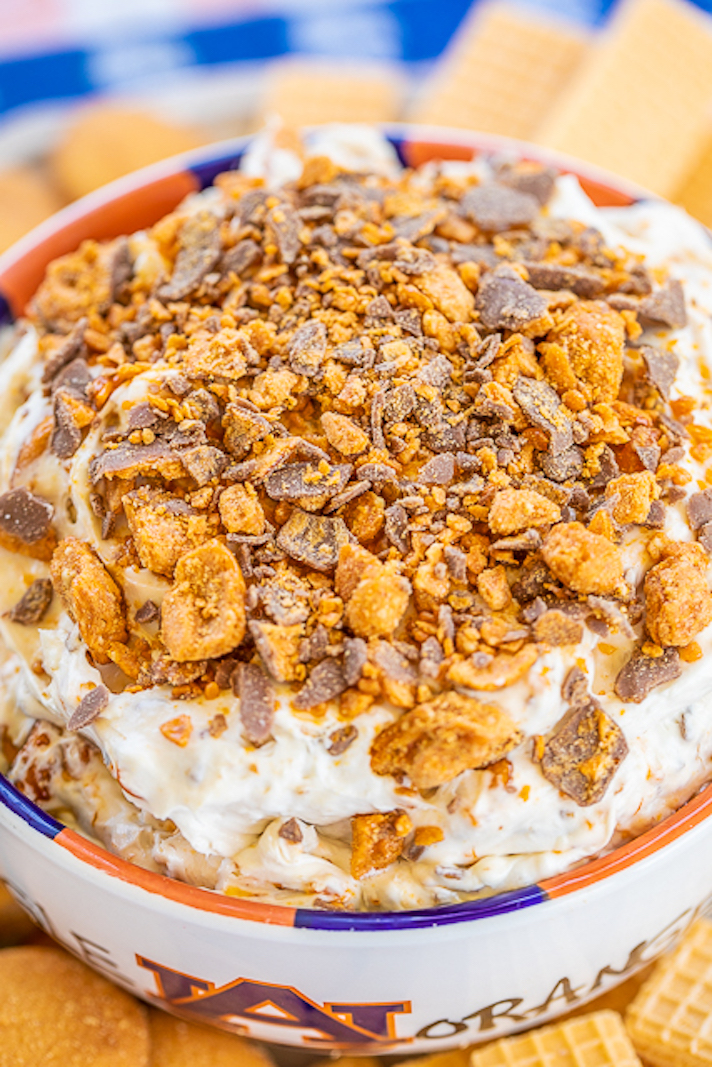 STYLECASTER | 17 Halloween Dips You Can Serve In A Pumpkin | Butterfinger Dip