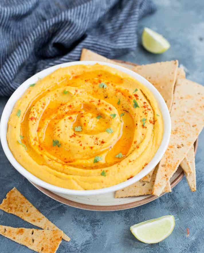 STYLECASTER | 17 Halloween Dips You Can Serve In A Pumpkin | Sweet Potato Hummus