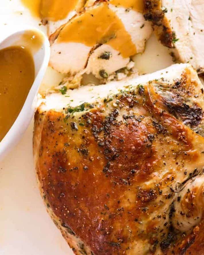STYLECASTER | 17 Slow-Cooker Turkey Recipes That Feed A Crowd | Garlic-Herb Turkey Breast