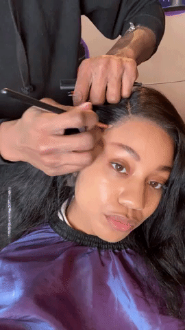 applying makeup to wig