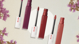 Maybelline New York Super Stay Matte Ink Liquid Lipstick in three different shades on top of a floral background.