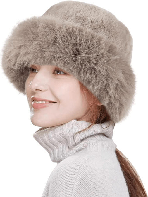 A model wearing a greige fluffy bucket hat from Amazon