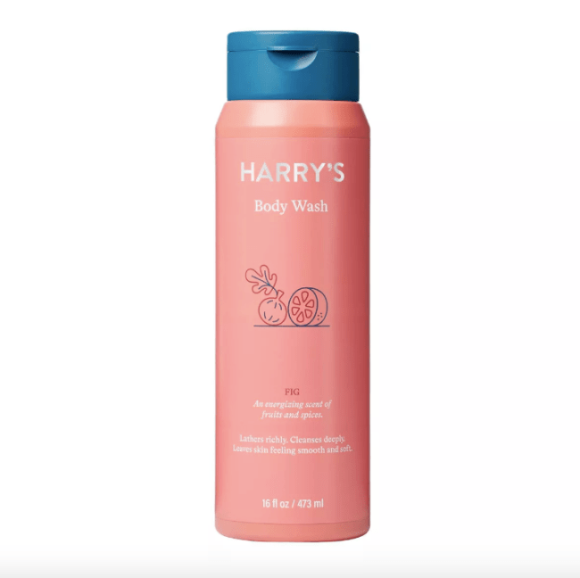 Harry's Fig Body Wash in a salmon colored bottle with a navy blue cap.