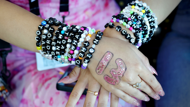Taylor Swift fan wearing friendship bracelets at The Eras Tour.