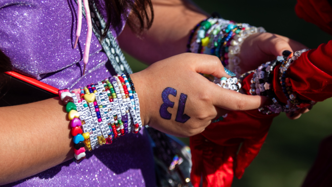 Taylor Swift fans wearing friendship braclets at Eras Tour