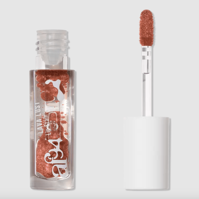 A peachy colored lip stain that resembles a lava lamp in a clear bottle.
