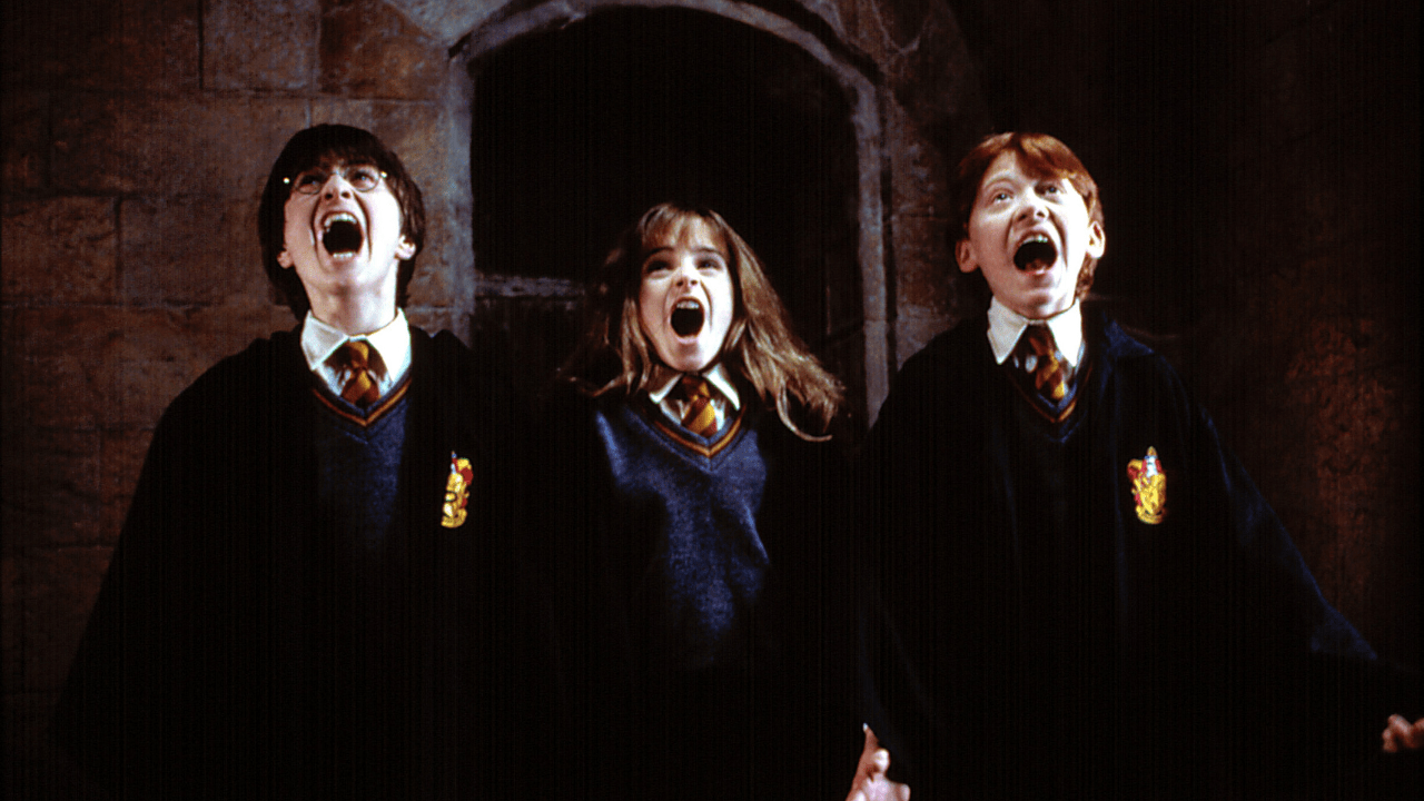 Daniel Radcliffe, Emma Watson and Rupert Grint in Harry Potter.