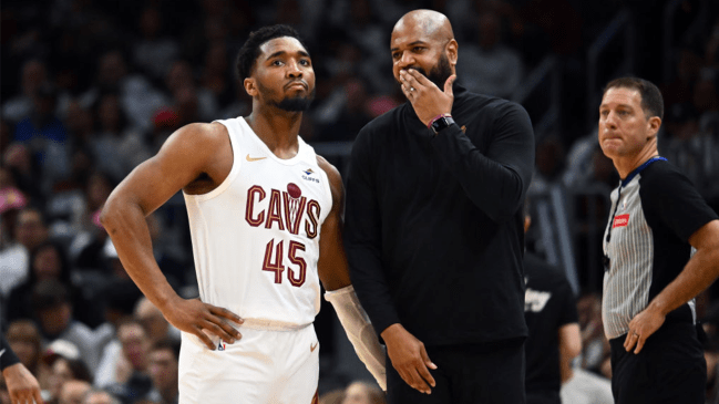 Donovan Mitchell #45 listens to head coach J.B. Bickerstaff of the Cleveland Cavaliers during the fourth quarter of game two of the Eastern Conference First Round Playoffs against the Orlando Magic at Rocket Mortgage Fieldhouse on April 22, 2024 in Cleveland, Ohio. The Cavaliers defeated the Magic 96-86. 