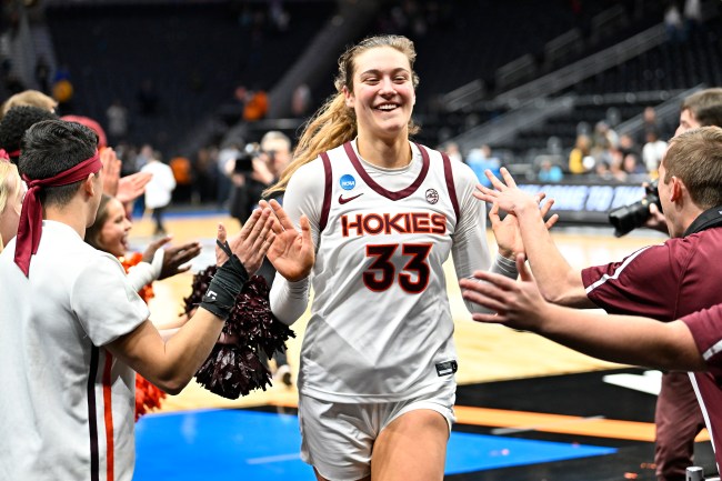 SEATTLE, WASHINGTON - MARCH 25: Elizabeth Kitley #33 of the Virginia Tech Hokies reacts as she runs off the court after defeating the Tennessee Lady Vols 73-64 in the Sweet Sixteen round of the NCAA Women's Basketball Tournament at Climate Pledge Arena on March 25, 2023 in Seattle, Washington.