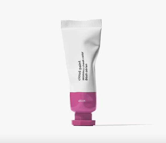 Glossier Cloud Paint in Wisp, a light purple liquid blush in a bottle.
