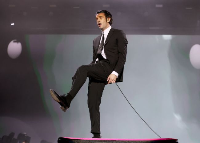 Matty Healy of The 1975 performs live on stage at Reading Festival day three on August 28, 2022 in Reading, England.