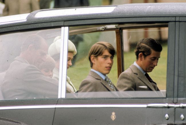 Prince Philip, Duke of Edinburgh, Prince Edward, Queen Elizabeth II, Prince Charles, Prince of Wales (right) and Prince Andrew, the Duke of York attend the Braemar Highland Games on September 15, 1975 in Scotland, United Kingdom.