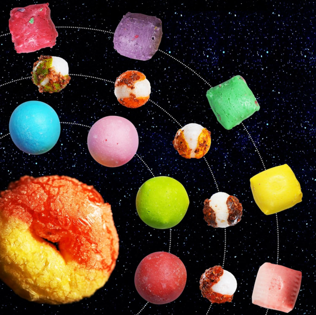 Freeze-dried, space-themed snacks on a black starry background