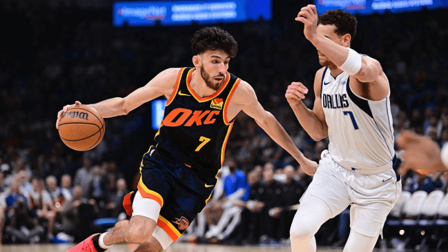Chet Holmgren #7 of the Oklahoma City Thunder handles the ball during the first half against the Dallas Mavericks at Paycom Center on April 14, 2024 in Oklahoma City, Oklahoma. 