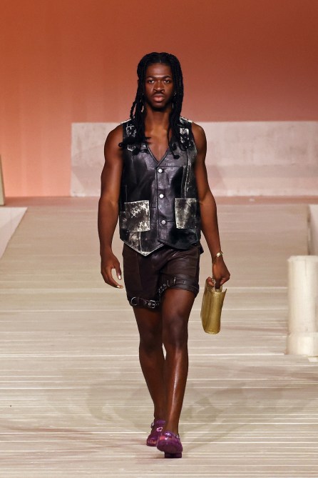 Lil Nas X walks the runway at the Coach S/S 2023 Fashion Show during New York Fashion Week at Park Avenue Armory on September 12, 2022 in New York City.