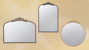 Three mirrors in brass, gold, and black with ornate molding at the top.