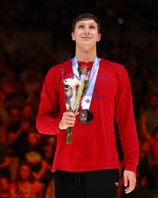 INDIANAPOLIS, INDIANA - JUNE 23: Bobby Finke and David Johnston of the United States look on during the medal ceremony for the Men's 1500m freestyle final on Day Nine of the 2024 U.S. Olympic Team Swimming Trials at Lucas Oil Stadium on June 23, 2024 in Indianapolis, Indiana.