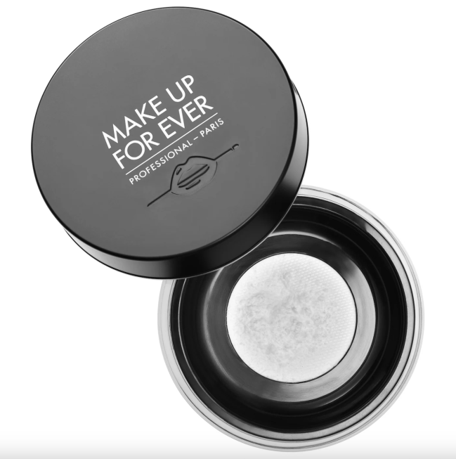 Make Up For Ever Ultra HD Microfinishing Loose Powder in a black pot.
