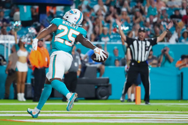 Jaylen Wright #25 of the Miami Dolphins celebrates scoring a touchdown against the Atlanta Falcons during the second quarter in a preseason game at Hard Rock Stadium on August 09, 2024 in Miami Gardens, Florida.