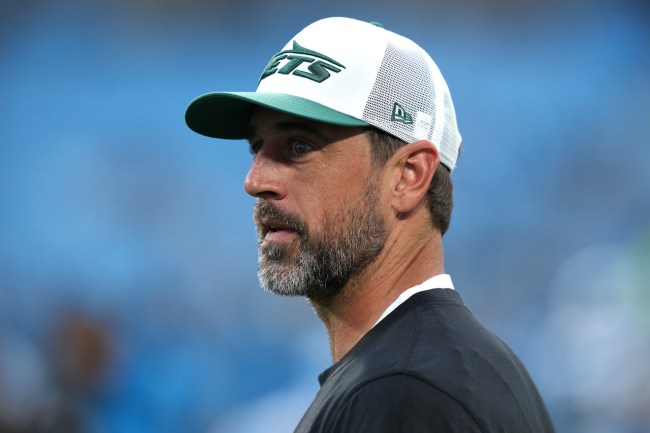 Aaron Rodgers #8 of the New York Jets looks on before their preseason game against the Carolina Panthers at Bank of America Stadium on August 17, 2024 in Charlotte, North Carolina.