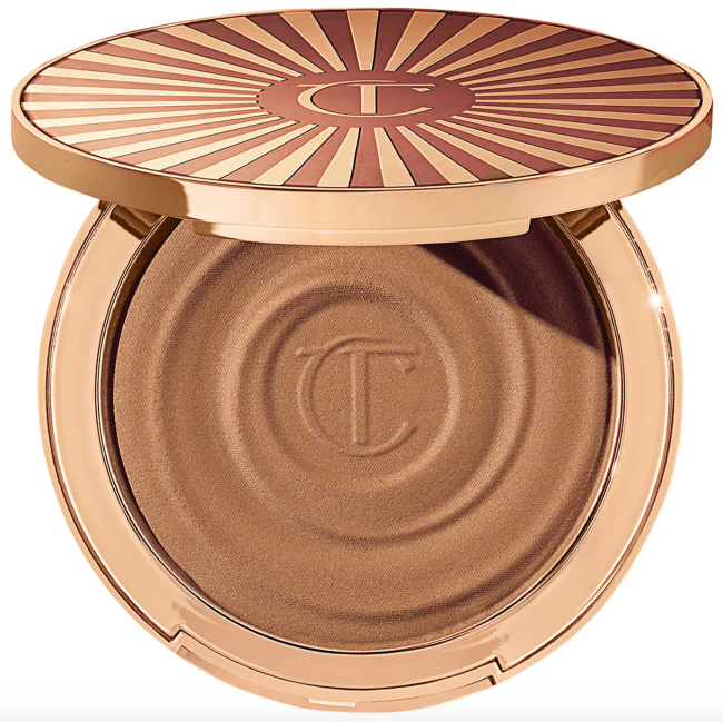 Charlotte Tilbury Sun-Kissed Glow Cream Bronzer in a gold compact.