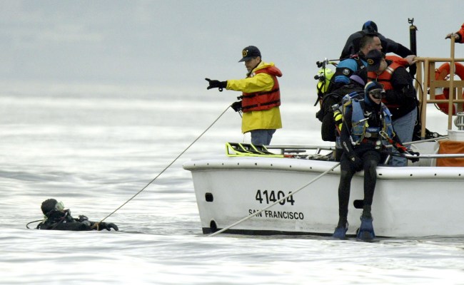 A diver receives instructions while searching for the body of missing pregnant woman Laci Peterson January 11, 2003 in the San Francisco Bay near Berkeley, California. The day-long search, prompted by a reading from a sonar mission, turned up a large anchor. Peterson has been missing since December 24, 2002.