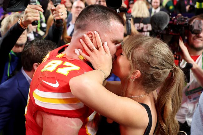 Taylor Swift & Travis Kelce kissing at the 2024 Super Bowl