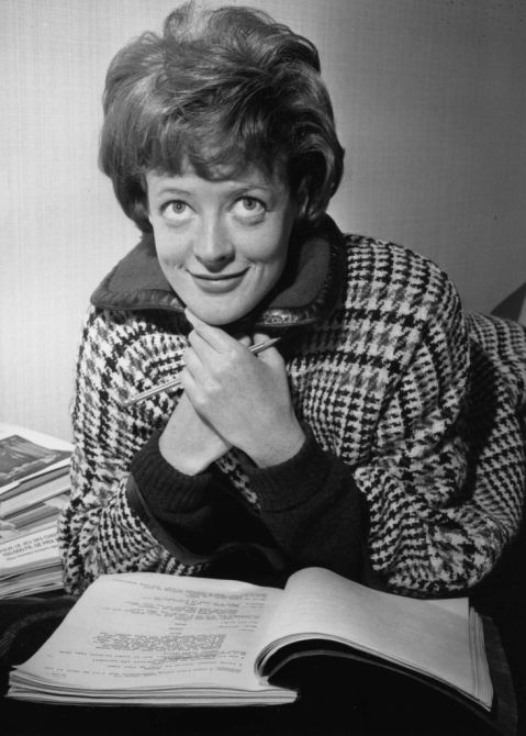 Maggie Smith reading a script shortly after she was named Stage Actress of the Year by the Variety Club of Great Britain.