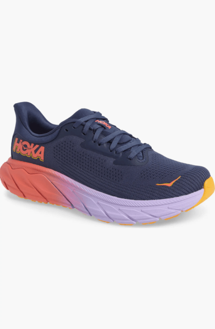 Hoka Arahi 7 in a dark blue, lavender, orange-red colorway