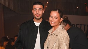 LONDON, ENGLAND - FEBRUARY 16: Tommy Fury and Molly-Mae Hague attend the PrettyLittleThing X Molly-Mae show at The Londoner Hotel on February 16, 2022 in London, England