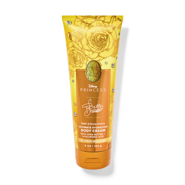 Belle Ultimate Hydration Body Cream in a gold bottle.