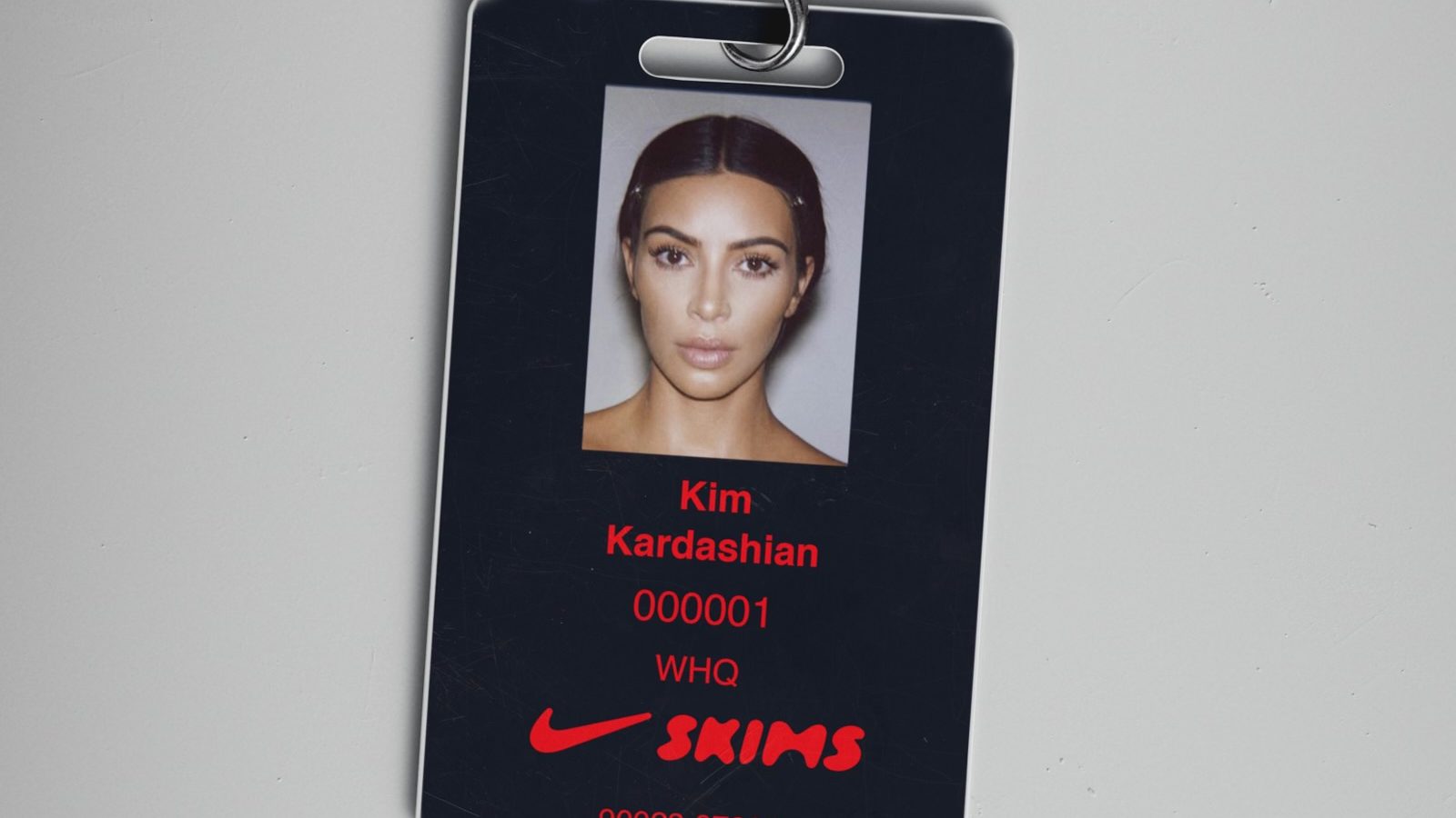 Kim Kardashian's NikeSKIMS badge.