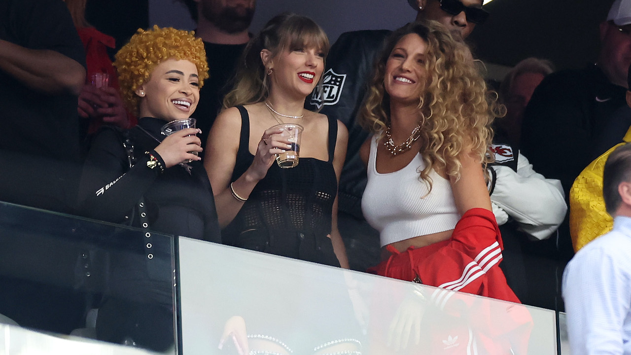 Taylor Swift shares a laugh with Ice Spice and Blake Lively in a luxury suite at 2024's Super Bowl—a stark contrast to this year's reported guest list drama.