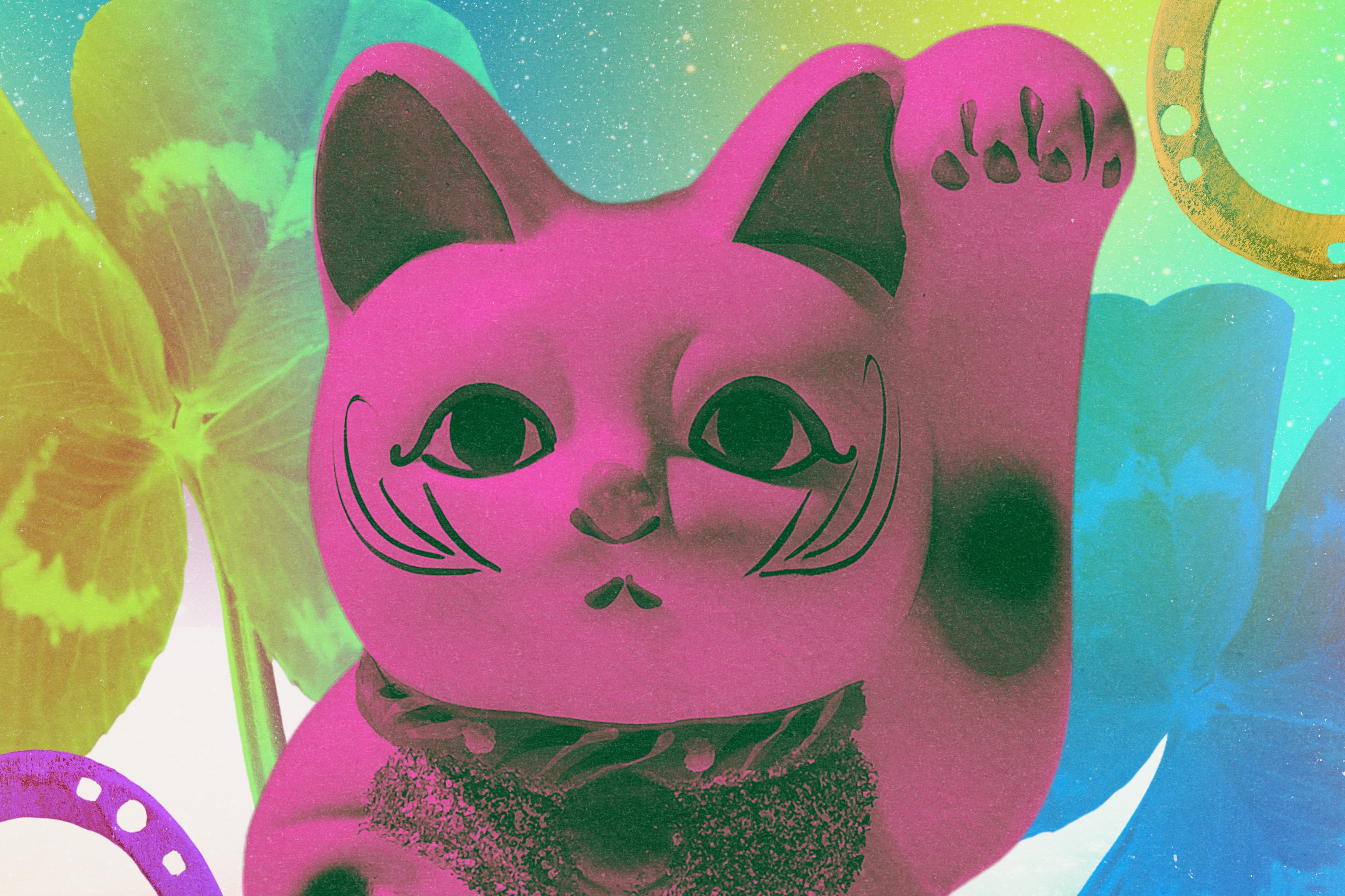 Maneki neko, a four-leaf clover, and other symbols of luck.