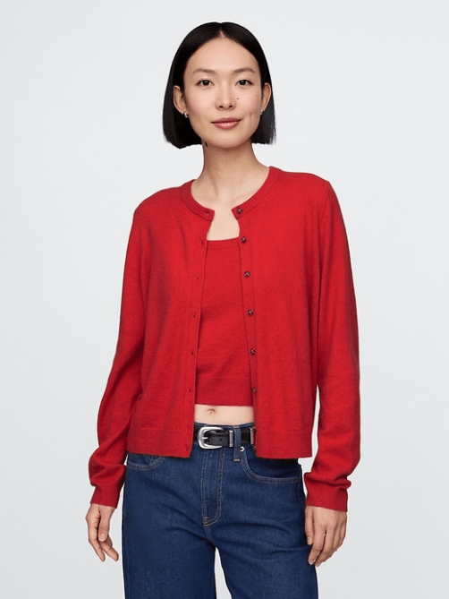 A model wearing the GAP CashSoft Cardigan in red