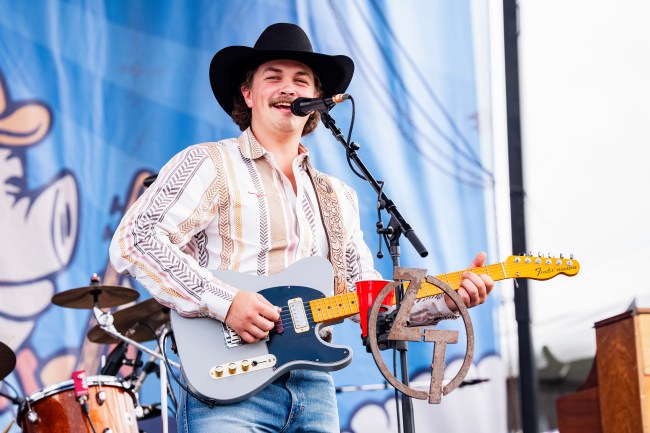 NEW ORLEANS, LOUISIANA - APRIL 05: Zach Top performs during 2925 Hogs For The Cause Festival at UNO Lakefront Arena on April 05, 2025 in New Orleans, Louisiana