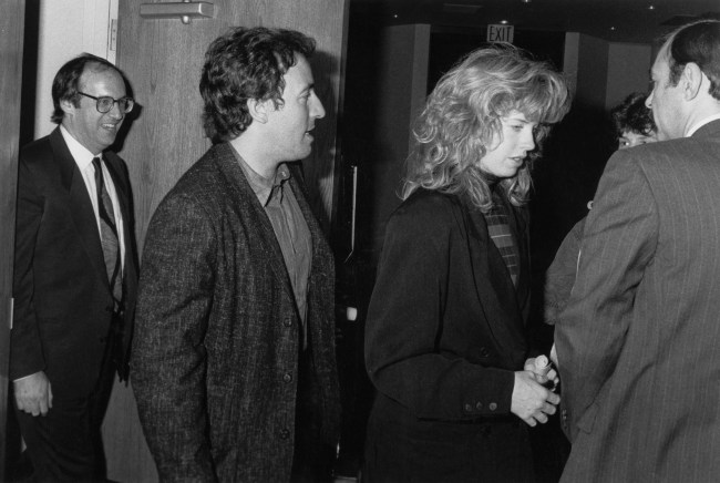 American singer and songwriter Bruce Springsteen and his wife, model and actress Julianne Phillips leave St Peter's Church in New York City after attending a memorial service for record producer John Hammond II, USA, 1987. The service was also attended by musicians Robert Palmer, Stevie Ray Vaughan and Mitch Miller.